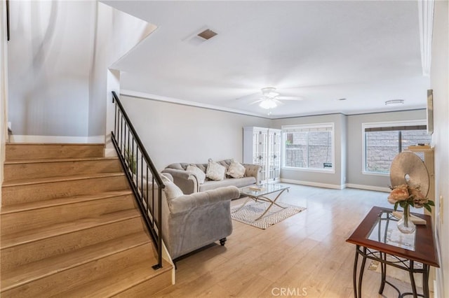2131 Dublin Ln Unit 3, Diamond Bar, CA 91765 - living room featuring a ceiling fan, wood finished floors, stairs, baseboards, and ornamental molding