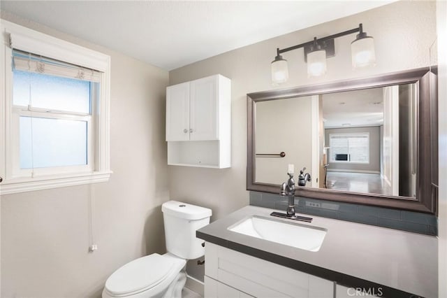 2131 Dublin Ln Unit 3, Diamond Bar, CA 91765 - half bath featuring toilet, vanity, and plenty of natural light