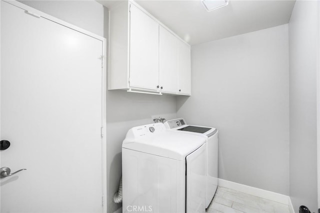 2131 Dublin Ln Unit 3, Diamond Bar, CA 91765 - laundry area featuring washing machine and dryer, cabinet space, and baseboards