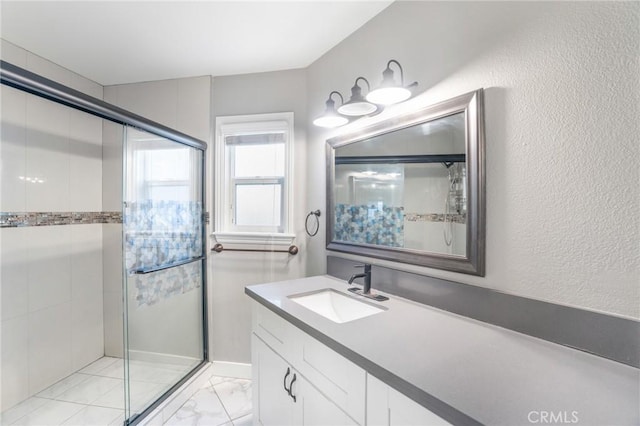 2131 Dublin Ln Unit 3, Diamond Bar, CA 91765 - full bath featuring a stall shower, marble finish flooring, vanity, and a textured wall