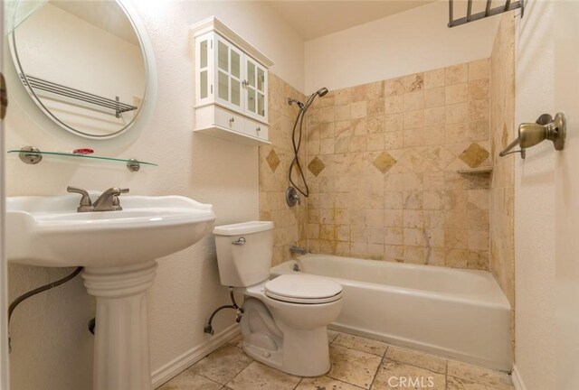 1422 Rock Glen Ave Unit 210, Glendale, CA 91205 - bathroom featuring  shower combination, toilet, baseboards, and a sink