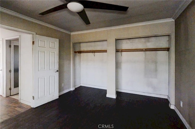 60220 Chalet Dr, Mountain Center, CA 92561 - unfurnished bedroom featuring multiple closets, wood finished floors, ornamental molding, baseboards, and a ceiling fan