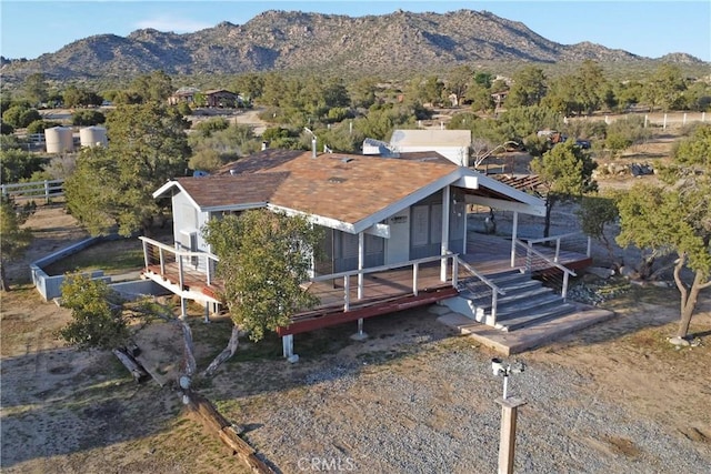 60220 Chalet Dr, Mountain Center, CA 92561 - view of front of home featuring a deck with mountain view