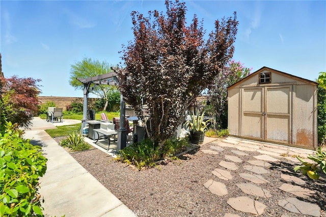 6875 Adainville Dr, Palmdale, CA 93552 - view of shed featuring a pergola