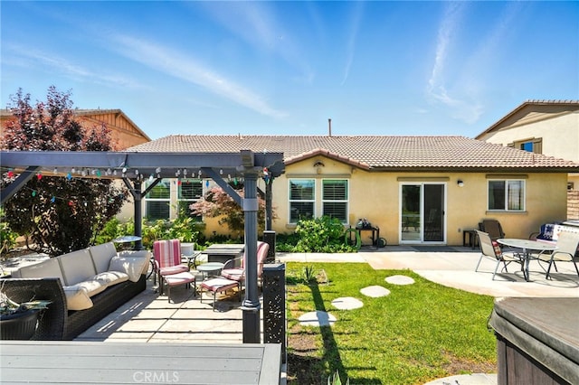 6875 Adainville Dr, Palmdale, CA 93552 - rear view of house featuring an outdoor living space, stucco siding, a tile roof, a yard, and a pergola