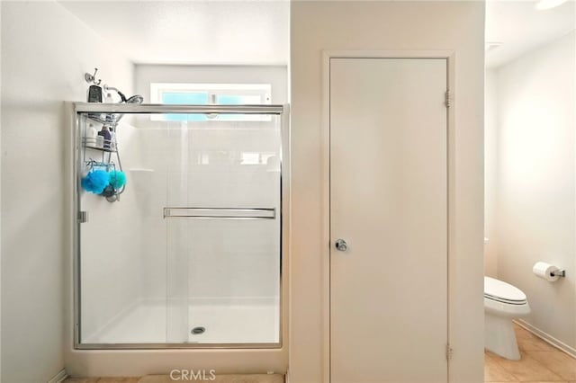 6875 Adainville Dr, Palmdale, CA 93552 - bathroom featuring a stall shower and tile patterned flooring