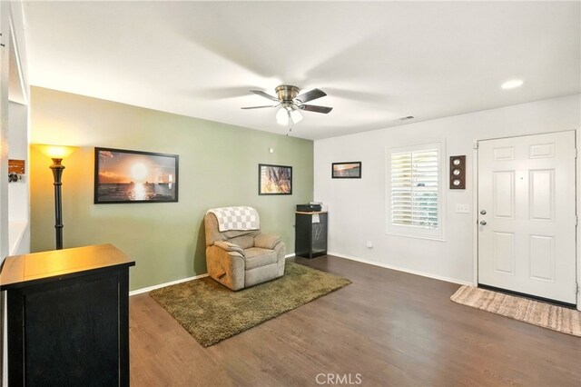 6875 Adainville Dr, Palmdale, CA 93552 - sitting room with dark wood-style flooring and ceiling fan