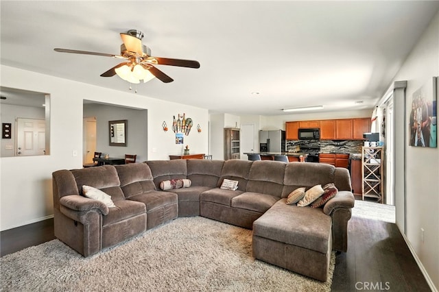 6875 Adainville Dr, Palmdale, CA 93552 - living room featuring wood finished floors and ceiling fan