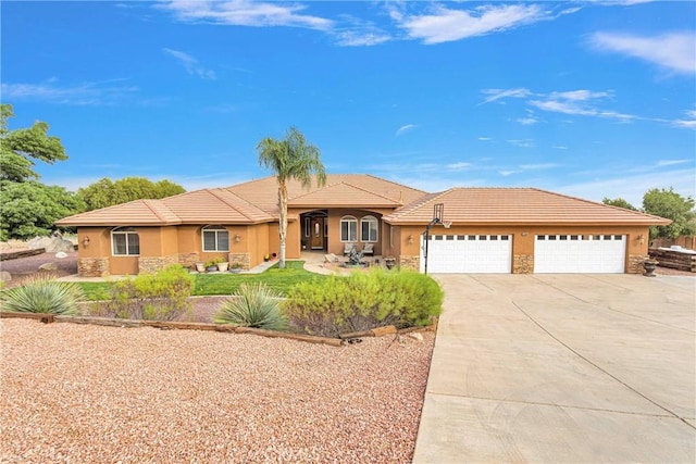 22428 Valley View Rd, Apple Valley, CA 92308 - ranch-style house featuring stone siding, driveway, and stucco siding