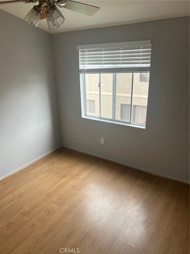 4816 S Fork Rd, Chino, CA 91719 - empty room with light wood finished floors and ceiling fan