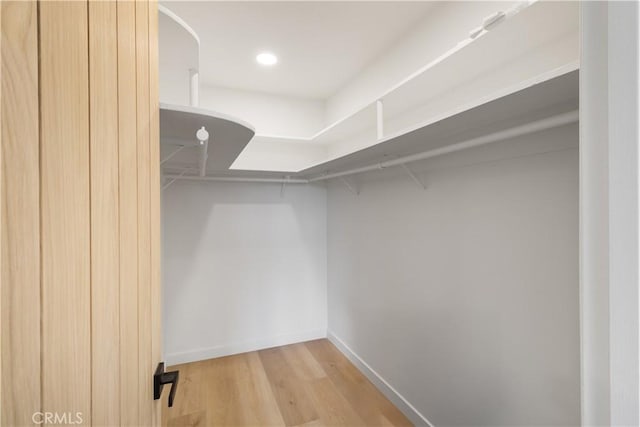 3695 Linden Ave Unit 10C, Long Beach, CA 90807 - walk in closet with wood finished floors