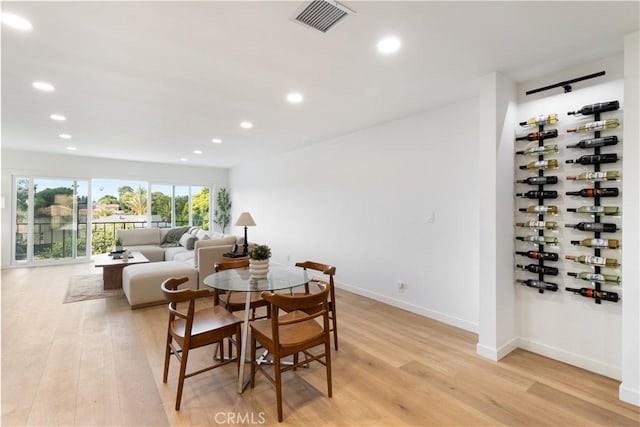3695 Linden Ave Unit 10C, Long Beach, CA 90807 - dining area featuring light wood-style flooring, recessed lighting, and baseboards