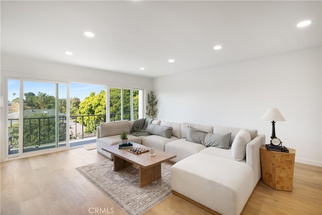 3695 Linden Ave Unit 10C, Long Beach, CA 90807 - living area with light wood-style flooring and recessed lighting
