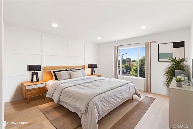 3695 Linden Ave Unit 10C, Long Beach, CA 90807 - bedroom featuring light wood-style flooring and recessed lighting