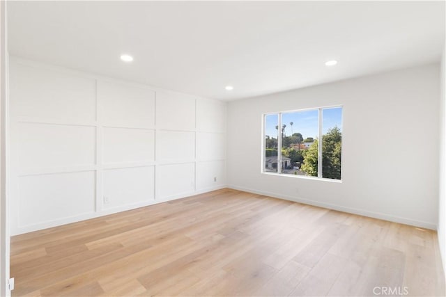 3695 Linden Ave Unit 10C, Long Beach, CA 90807 - unfurnished room with light wood-type flooring, recessed lighting, and baseboards