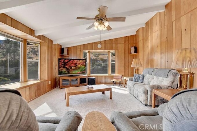 28560 Cruthers Creek Rd, Pearblossom, CA 93553 - living area featuring wood walls, ceiling fan, and carpet