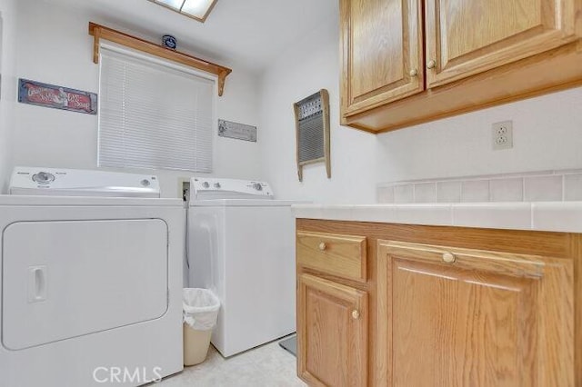 28560 Cruthers Creek Rd, Pearblossom, CA 93553 - laundry area with washer and dryer and cabinet space