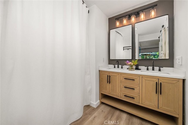511 San Nicholas Ct, Laguna Beach, CA 92651 - bathroom with wood finished floors and double vanity
