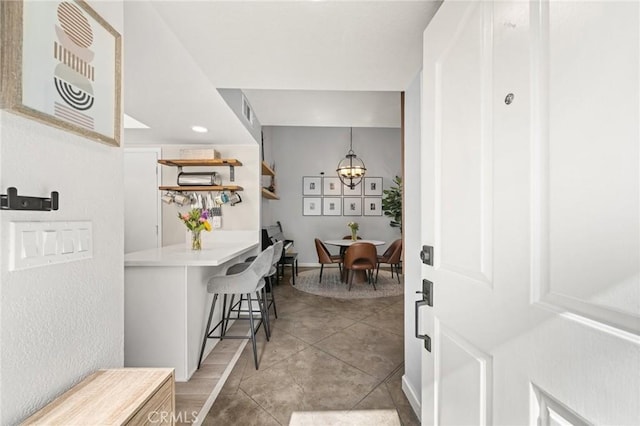 511 San Nicholas Ct, Laguna Beach, CA 92651 - entryway with light tile patterned floors and recessed lighting