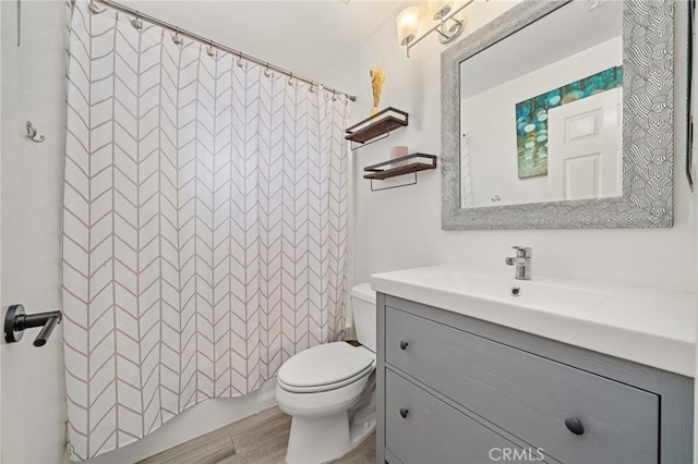 511 San Nicholas Ct, Laguna Beach, CA 92651 - bathroom with vanity, wood finished floors, and shower / bath combo with shower curtain