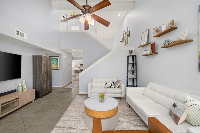 511 San Nicholas Ct, Laguna Beach, CA 92651 - living area featuring ceiling fan, stairs, and a high ceiling