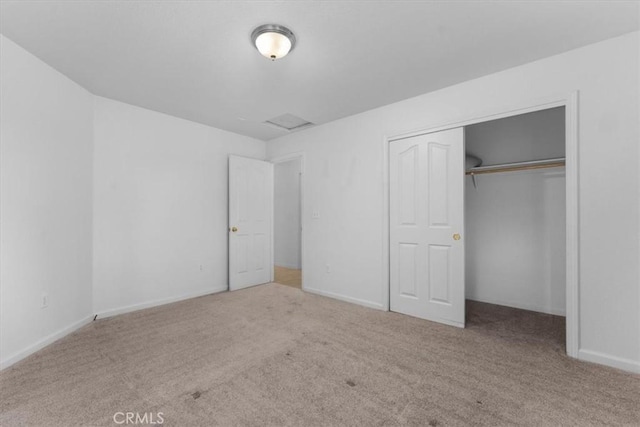 22022 Grove Cir, Red Bluff, CA 96080 - unfurnished bedroom with carpet, a closet, and baseboards