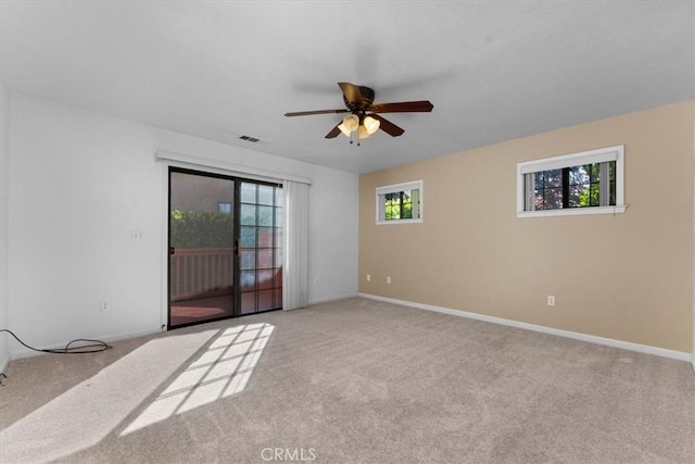 22022 Grove Cir, Red Bluff, CA 96080 - empty room with a ceiling fan, carpet, and baseboards