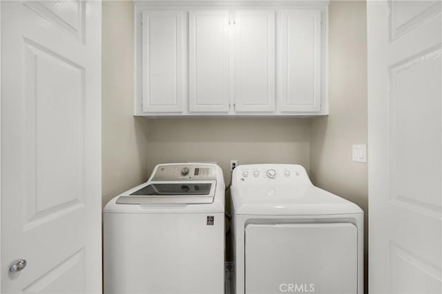 13 Arborside Way, Mission Viejo, CA 92692 - laundry room featuring washing machine and clothes dryer and cabinet space