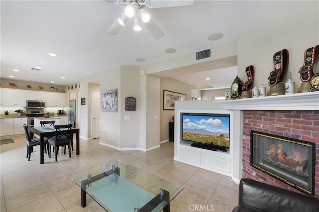 13 Arborside Way, Mission Viejo, CA 92692 - living room featuring a ceiling fan, light tile patterned floors, baseboards, a fireplace, and recessed lighting