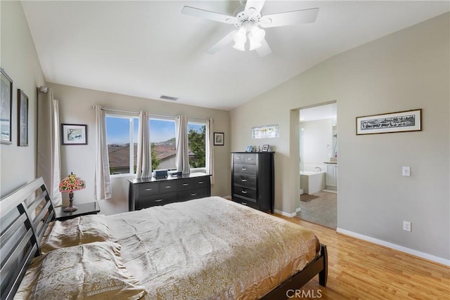 13 Arborside Way, Mission Viejo, CA 92692 - bedroom with vaulted ceiling, light wood finished floors, baseboards, ensuite bathroom, and ceiling fan