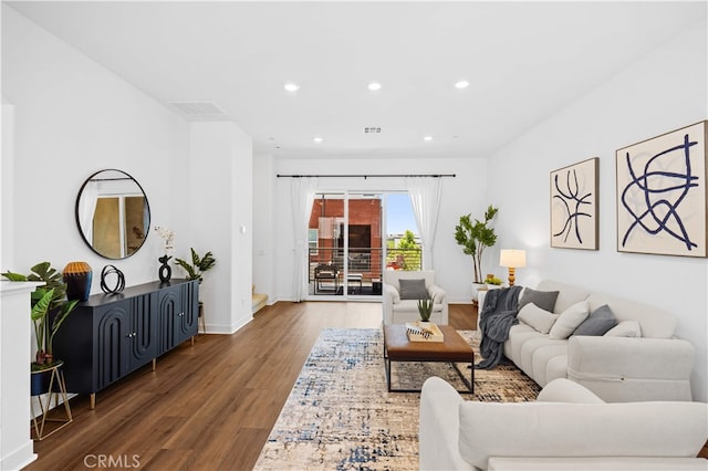 150 Abacus, Irvine, CA 92618 - living area featuring wood finished floors, baseboards, and recessed lighting