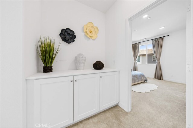 150 Abacus, Irvine, CA 92618 - corridor featuring light carpet, recessed lighting, and baseboards