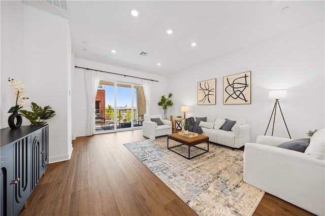 150 Abacus, Irvine, CA 92618 - living room featuring recessed lighting, wood finished floors, and baseboards