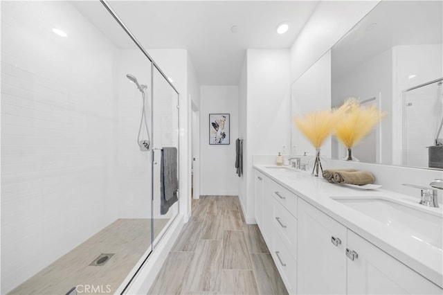 150 Abacus, Irvine, CA 92618 - bathroom with a stall shower, double vanity, and recessed lighting