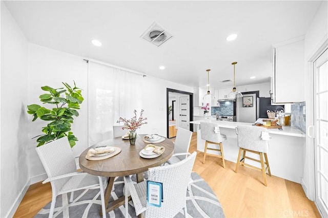 934 W Bonnie Brae Ct, Ontario, CA 91762 - dining space featuring light wood-type flooring and recessed lighting