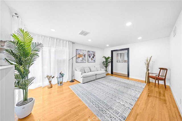 934 W Bonnie Brae Ct, Ontario, CA 91762 - living room with light wood-style flooring, recessed lighting, and baseboards