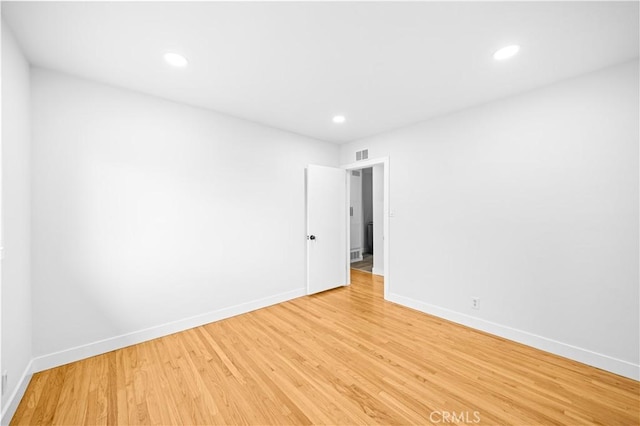 934 W Bonnie Brae Ct, Ontario, CA 91762 - empty room with baseboards, light wood finished floors, and recessed lighting