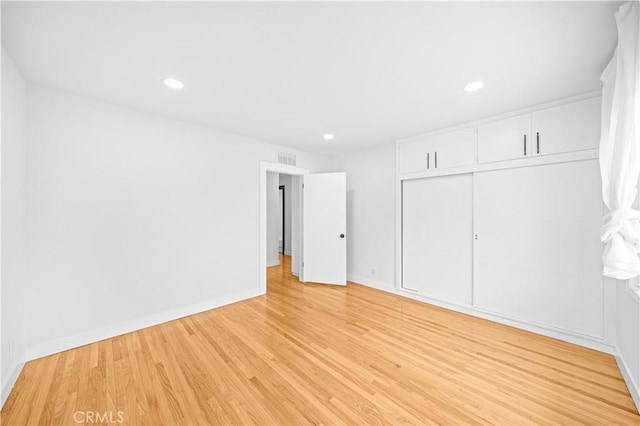 934 W Bonnie Brae Ct, Ontario, CA 91762 - unfurnished bedroom featuring light wood-style flooring, baseboards, a closet, and recessed lighting