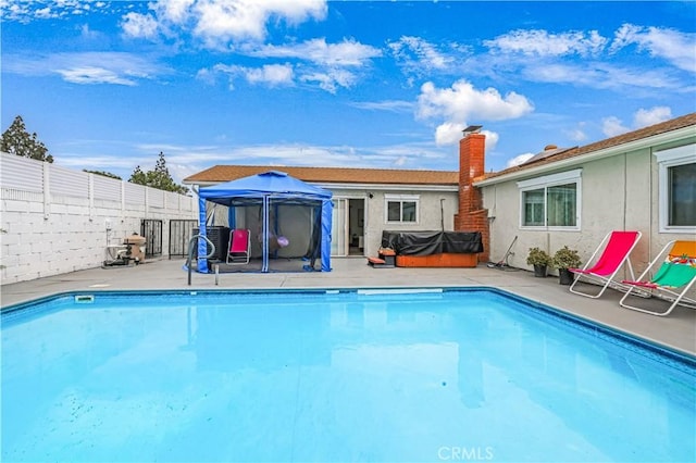 10415 Mapledale St, Bellflower, CA 90706 - view of pool featuring a gazebo, a fenced backyard, and a patio