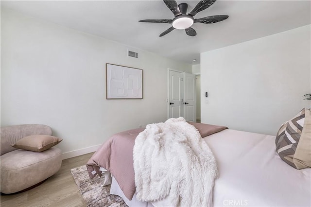 10415 Mapledale St, Bellflower, CA 90706 - bedroom featuring wood finished floors, ceiling fan, and baseboards