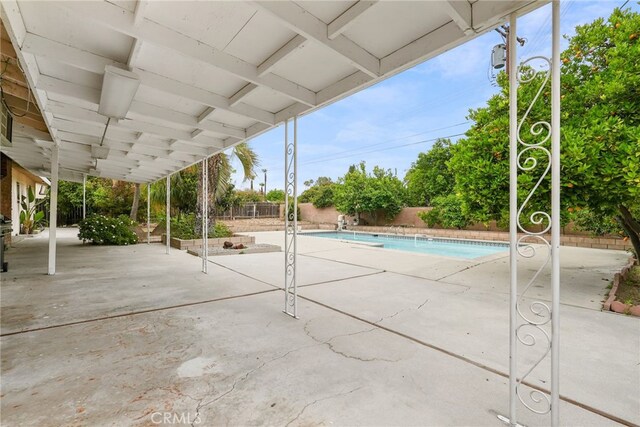 10120 Andasol Ave, Northridge, CA 91325 - view of swimming pool with a patio and a fenced backyard