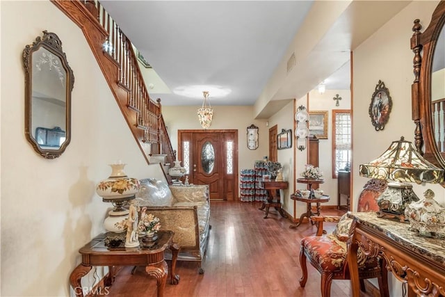 4611 S Gramercy Pl, Los Angeles, CA 90062 - foyer featuring wood-type flooring and stairway