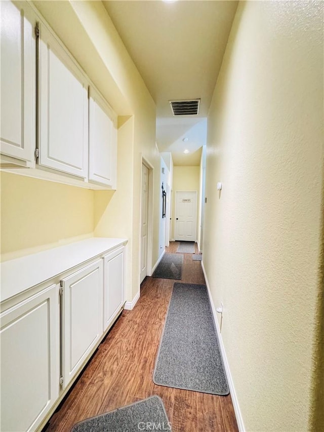 8925 Fallbrook Ct, Hesperia, CA 92344 - hall with wood finished floors and baseboards
