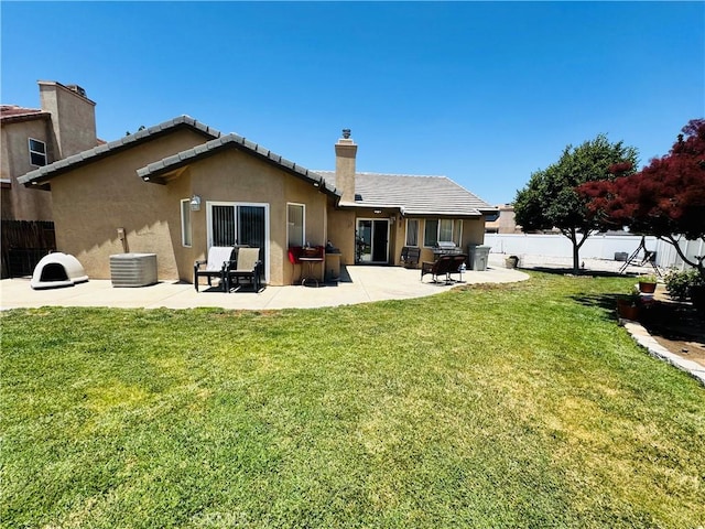 8925 Fallbrook Ct, Hesperia, CA 92344 - rear view of property with a chimney, a patio, stucco siding, central air condition unit, and a tile roof