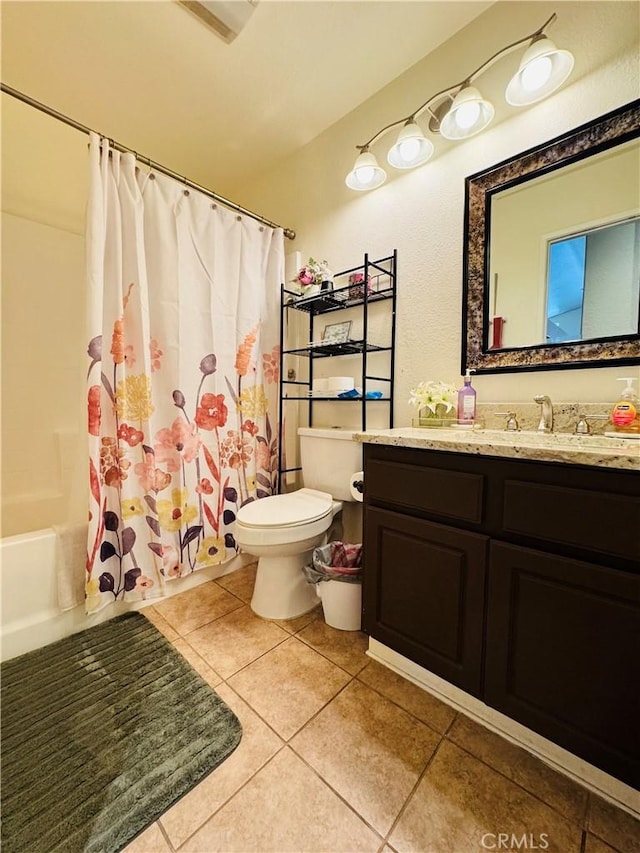 8925 Fallbrook Ct, Hesperia, CA 92344 - bathroom featuring vanity, tile patterned floors, and shower / tub combo with curtain