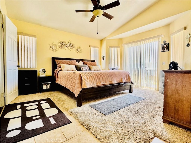 8925 Fallbrook Ct, Hesperia, CA 92344 - bedroom with lofted ceiling, access to outside, tile patterned floors, and ceiling fan