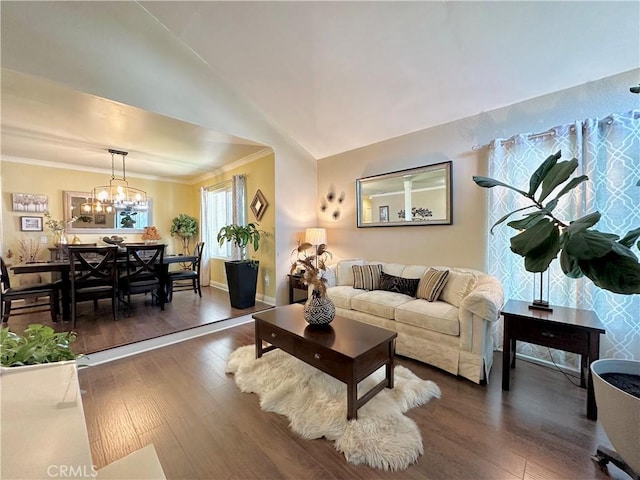18839 Watson Ave, Cerritos, CA 90703 - living area with dark wood-style flooring, a chandelier, ornamental molding, and baseboards