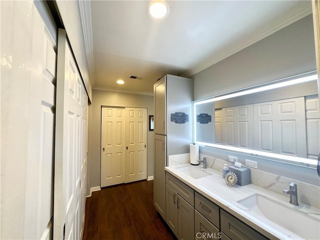 18839 Watson Ave, Cerritos, CA 90703 - full bathroom featuring double vanity, ornamental molding, wood finished floors, and recessed lighting