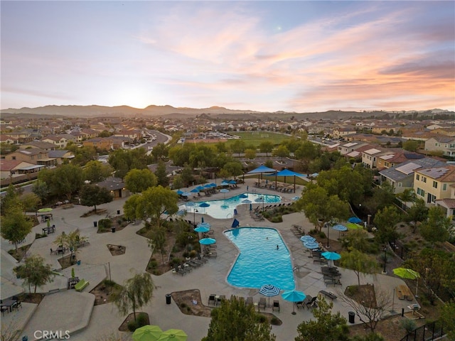 34452 Turquoise Ln, Murrieta, CA 92563 - aerial view at dusk of view of pool area, a mountain view, and a residential view