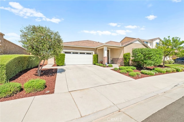 34452 Turquoise Ln, Murrieta, CA 92563 - view of front facade featuring an attached garage, concrete driveway, and stucco siding